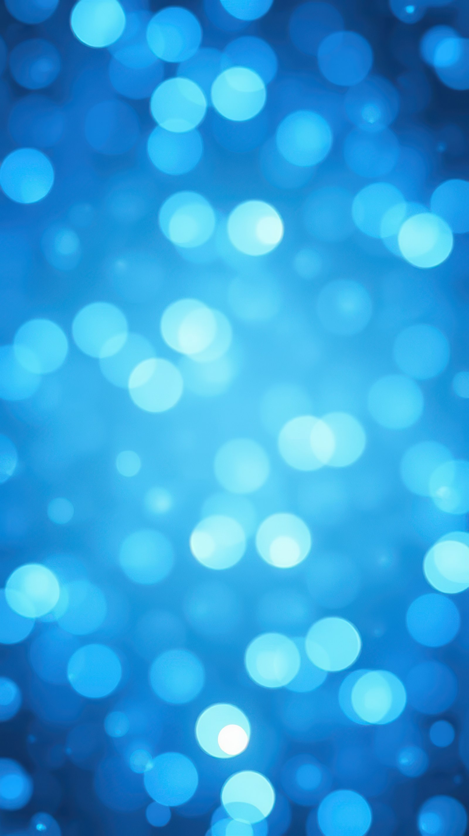 Soft blue bokeh background creating a calming atmosphere ideal for design projects or digital art